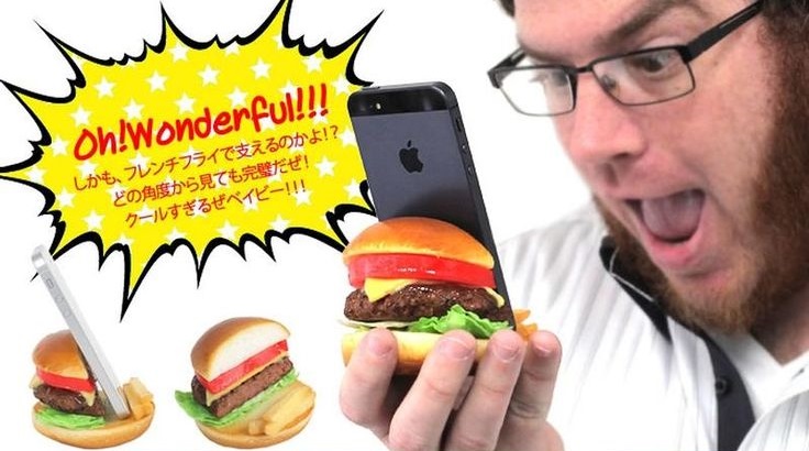 Image showing man using a hamburger shaped phone stand